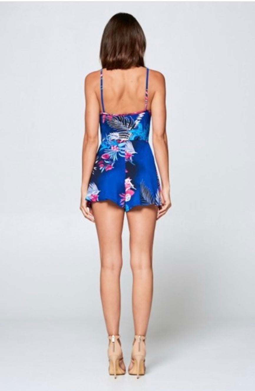 Tropical print romper with side tie.